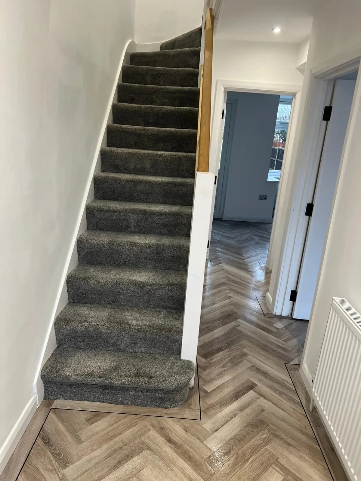 Freshly vacuumed stairs and hallway in an empty home